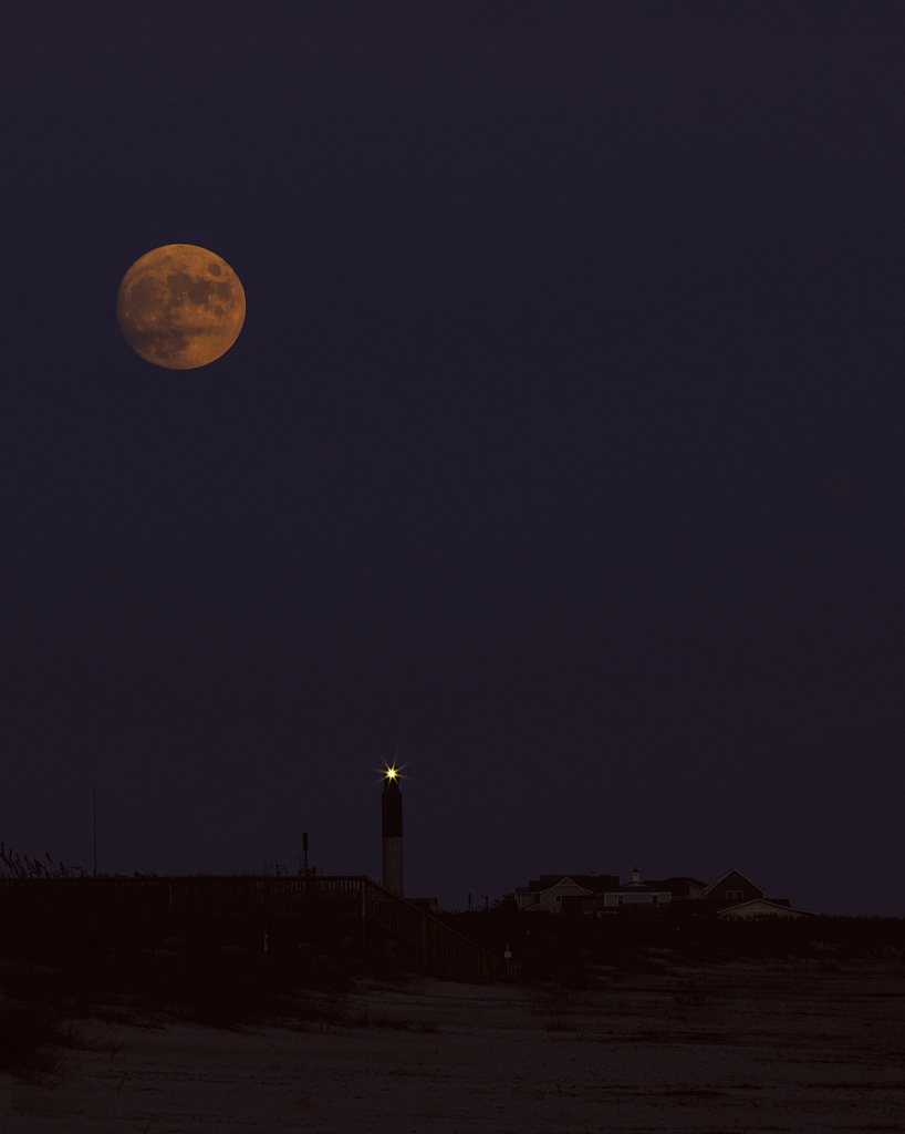 lighthouse and moon