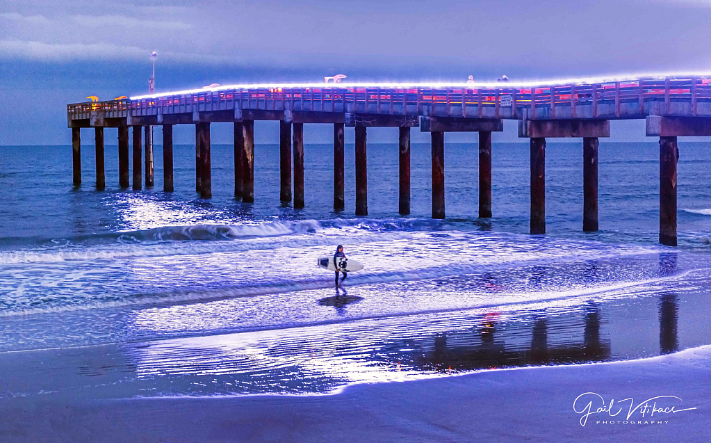 Surfing at night in St. Augustine