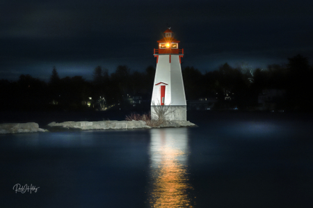 Lighthouse Guarding The Harbour