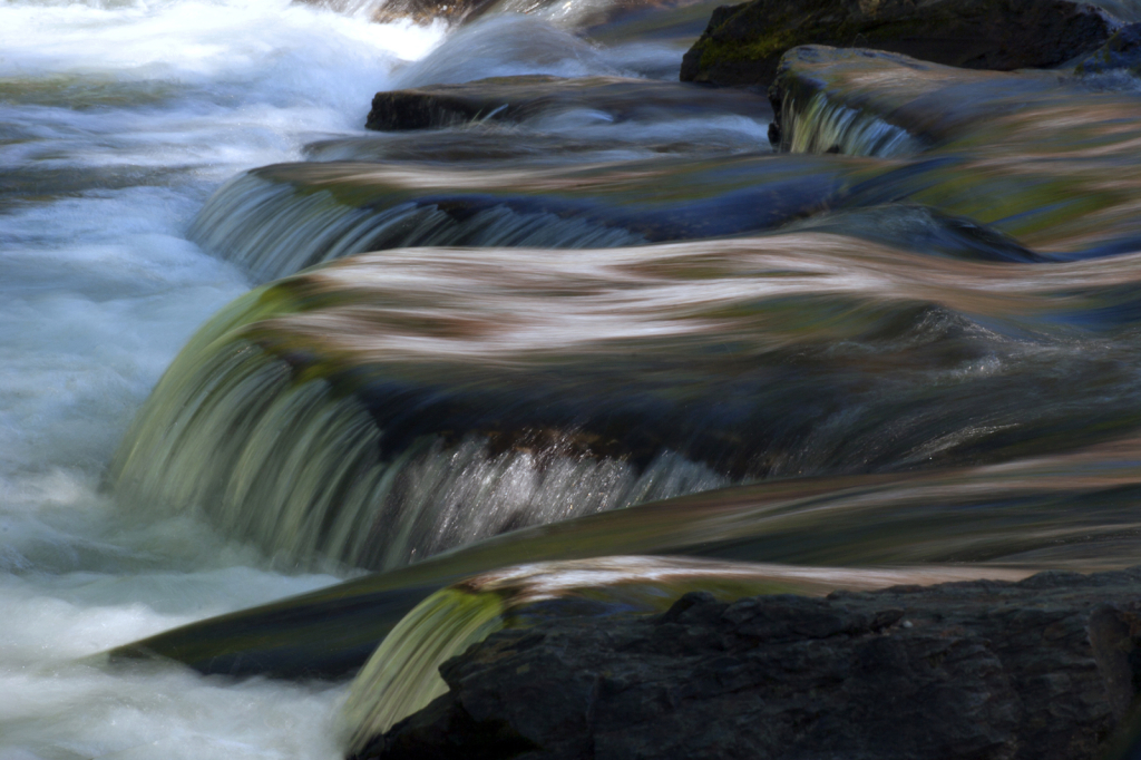 Flowing Over Rocks