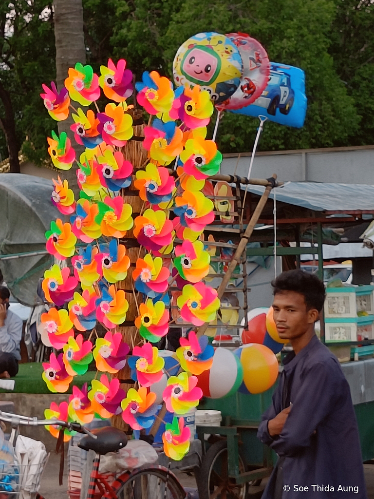 Seller Playing Fan