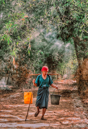 Old Man Carrying Water 