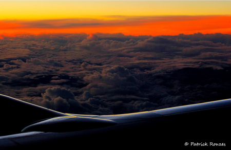 Sunset  Above The Clouds