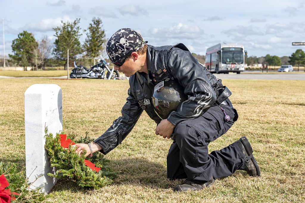 Paying respect to his father....