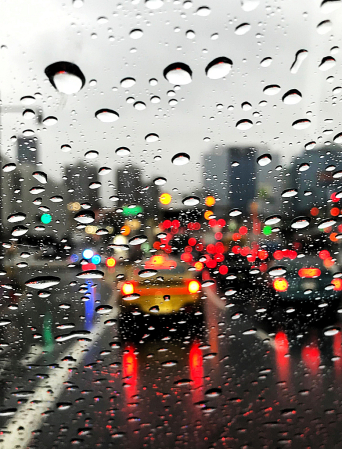 On a rainy day, in the traffic