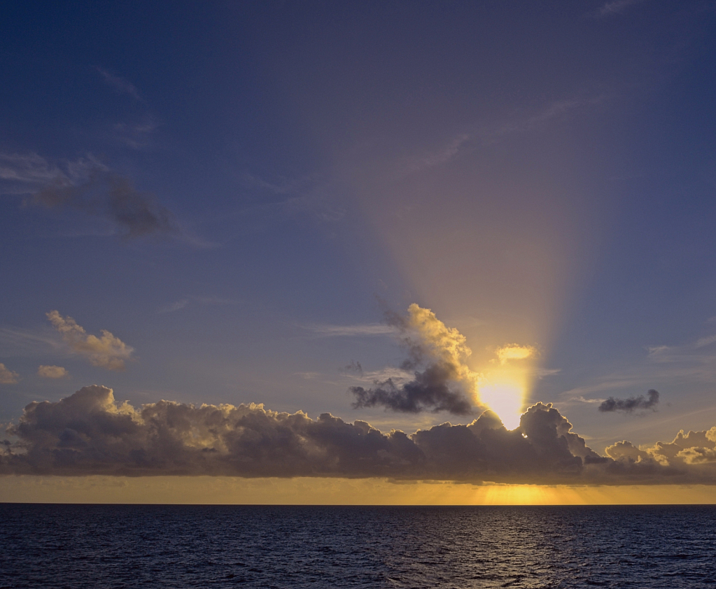 Sunset behind cloud