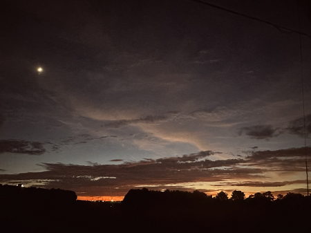 Bright moon at sunset