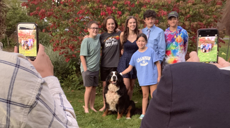 family photo including everyone’s best friend