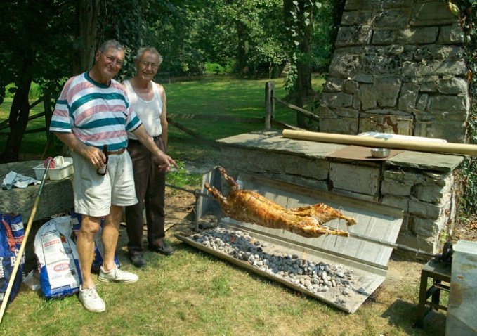 Jack and Alois cooking the lamb - 50 pounds!