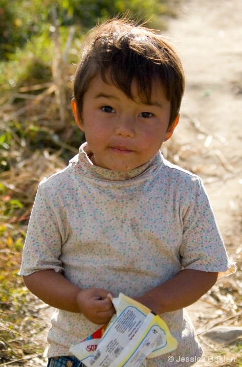 Bhutanese Boy with Potato Chips