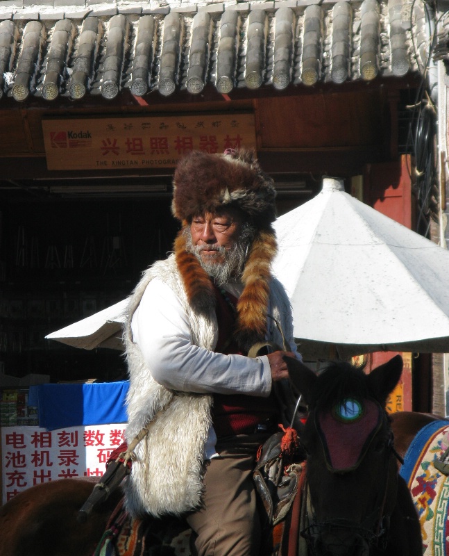 Lijiang Horseman in Public Square