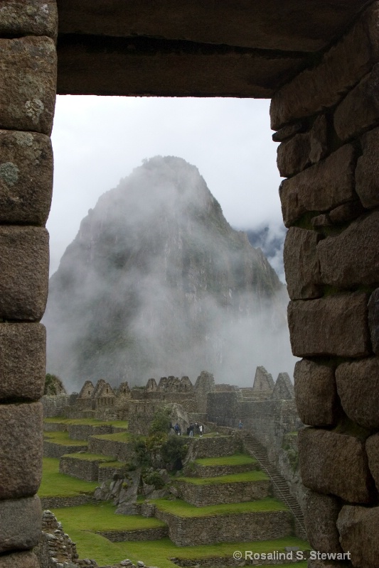 Wayanpicchu through doorway at Machu Picchu