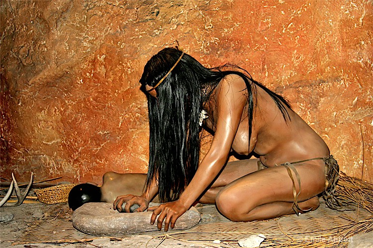 Ancient-woman-using-grinding stone