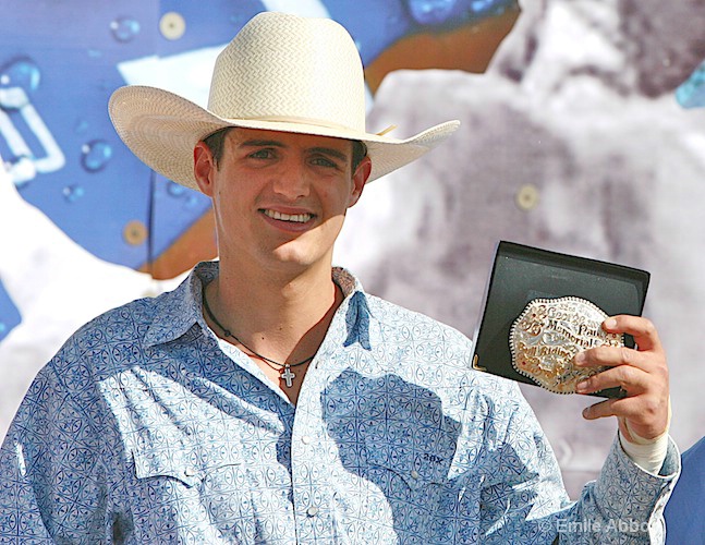 Hugo shows the crowd his buckle