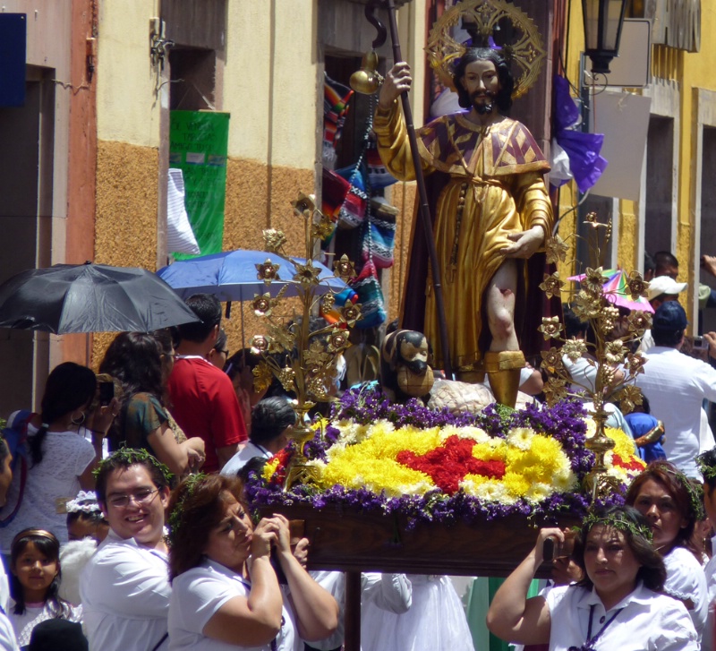 Carrying the statue