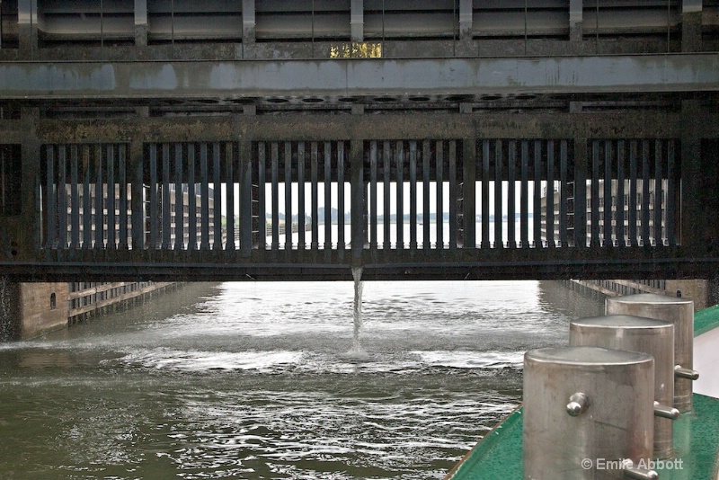 Water pouring from the opening gate.