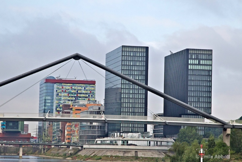 Cologne bridge framing multi-colored windows 