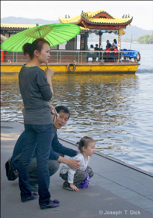 #497 westlake woman with green umbrella & child