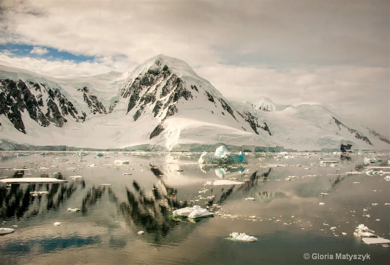 Reflections and grey skies, Antarctica