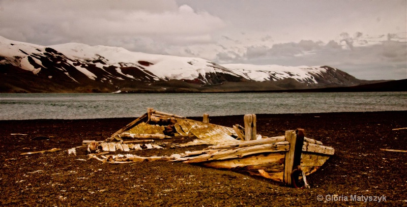 Antarctica landscape with abandoned whaling boat