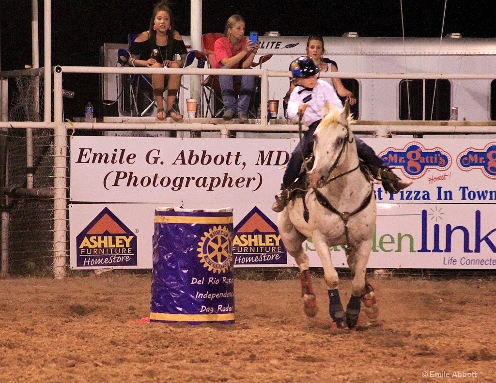 Young girl barrel racer