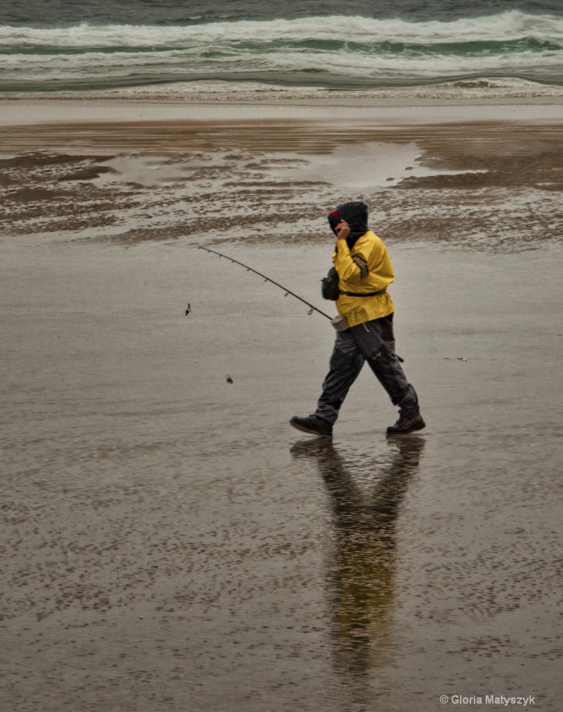 Fisherman in the rain, Maine, USA