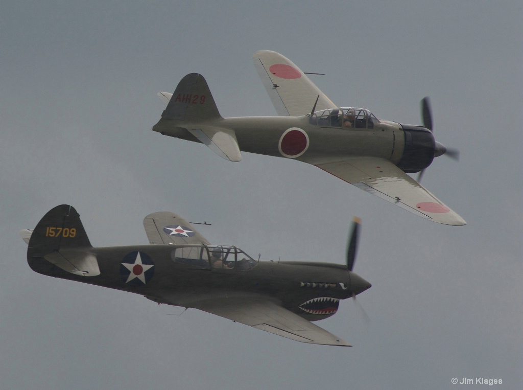 P-40E Warhawk and A6M2 Zero in Formation
