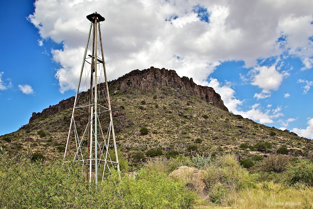 Broken windmill and hill