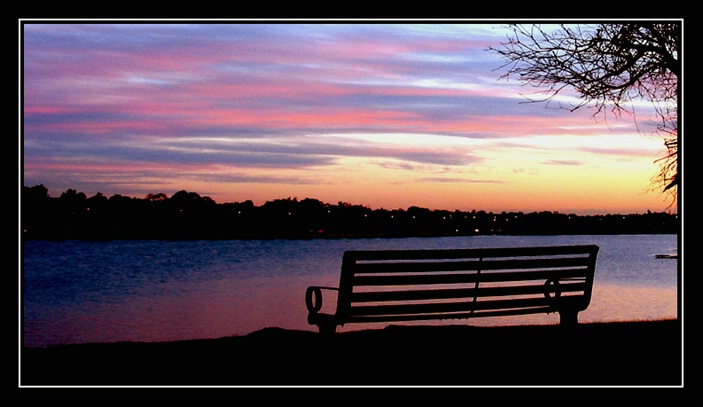 a bench-lake sunset