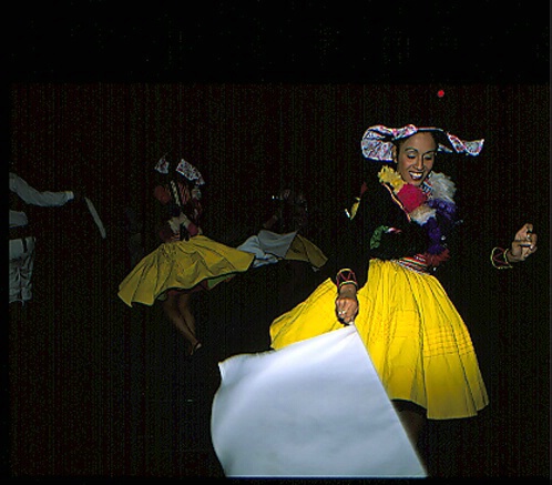 A dancer in yellow skirt 