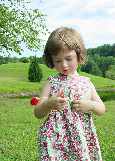 Girl with Red Flower