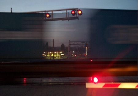 Gas Station Through Train Crossing