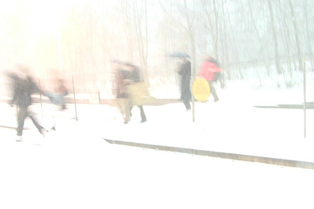Train Commuters in Snow