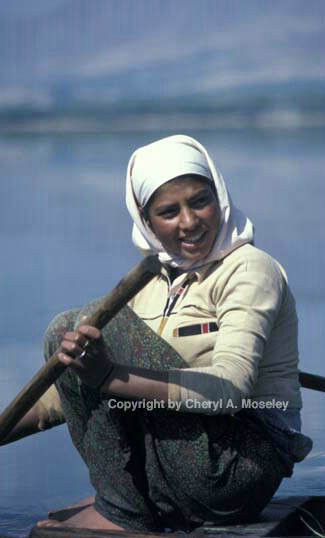 Kashmiri woman on boat 2 (closeup) - ID: 360246 © Cheryl  A. Moseley