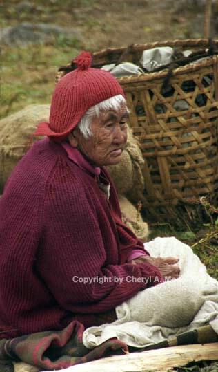 Elderly woman w/red hat, Bhutan 13-24 - ID: 362424 © Cheryl  A. Moseley