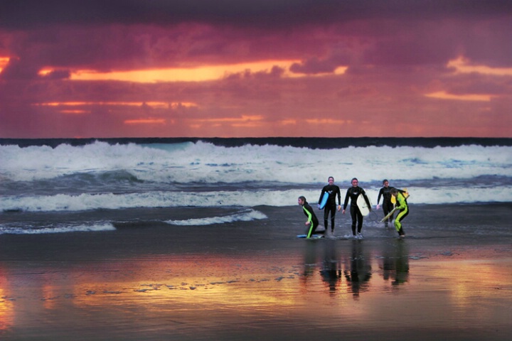 Surfer Girls at Sunset