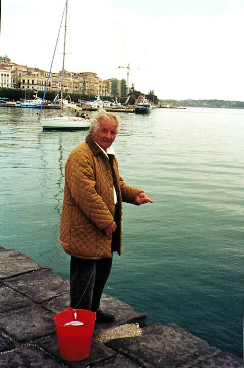 Fisherman in Syracusa, Sicily - ID: 444368 © James E. Nelson