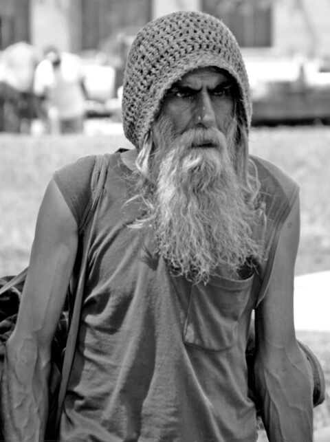 Homeless guy with piercing eyes.