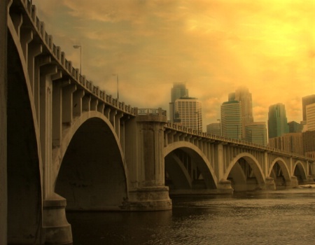 Golden Glow On Stone Arch Bridge