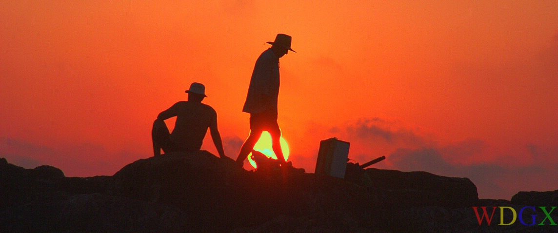 Fishermen at sunset