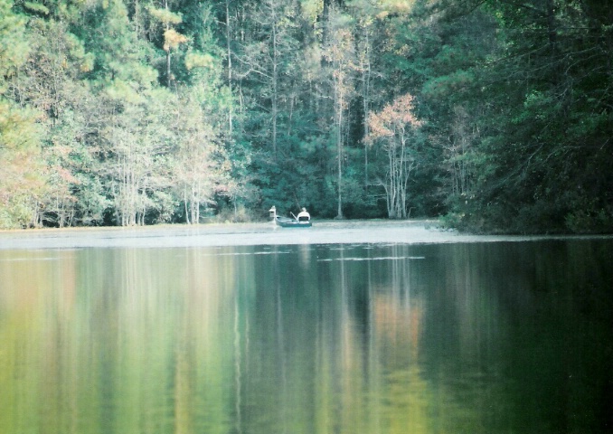 Man fishing on a Autum lake