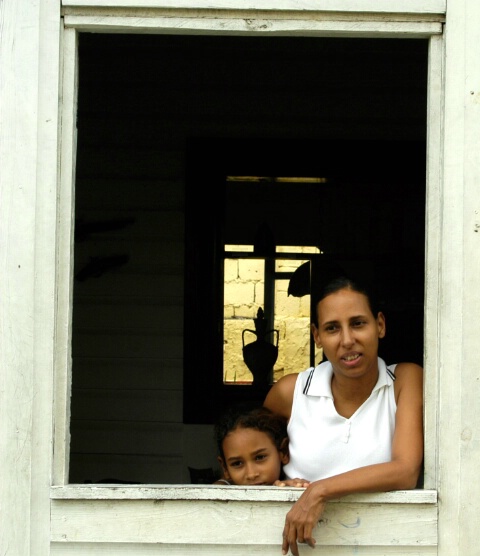 MOTHER AND DAUGHTER  AT THE WINDOW