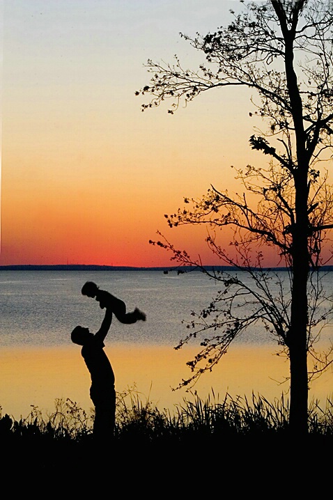 Sunset Silhouette - Father Lifting Son - ID: 754450 © Wendy M. Amdahl