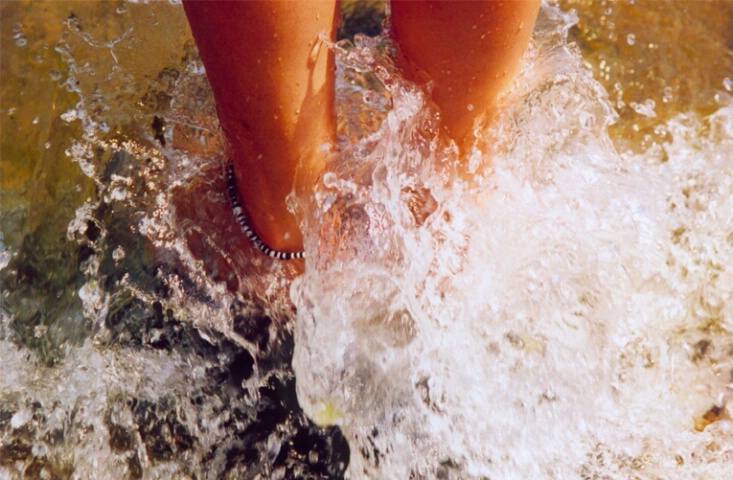 Feet in the waves