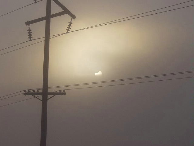 Thin Spot In Fog allowed to see Solar Eclipse