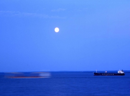 Phantom Ship Passing Under Moon