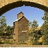 2Old Grain Elevator Framed by Bridge - ID: 1111153 © John Tubbs