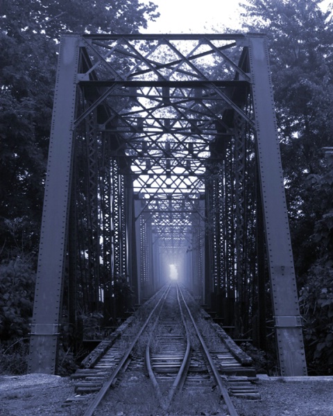 Railroad Bridge In Fog