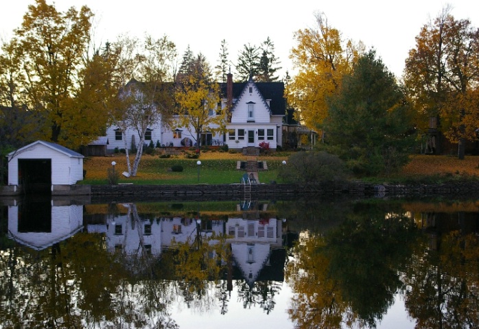 Fall house with reflection