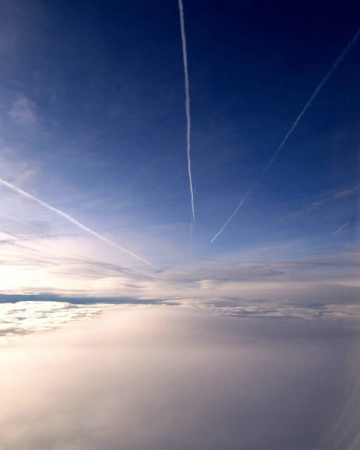 Plane Trails from air - Portrait
